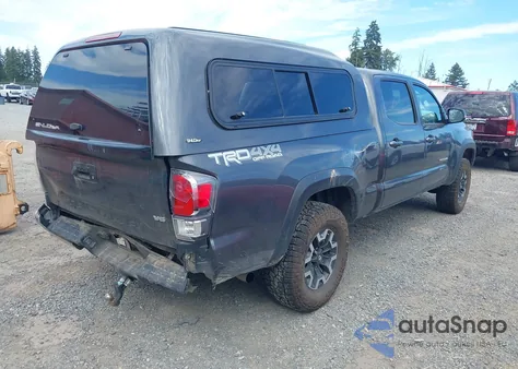 2021 Toyota Tacoma Trd Off-Road z USA, uszkodzony, nr VIN 3TMDZ5BN3MM104062